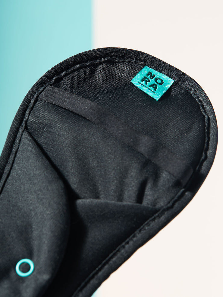 Moderate black pad tags